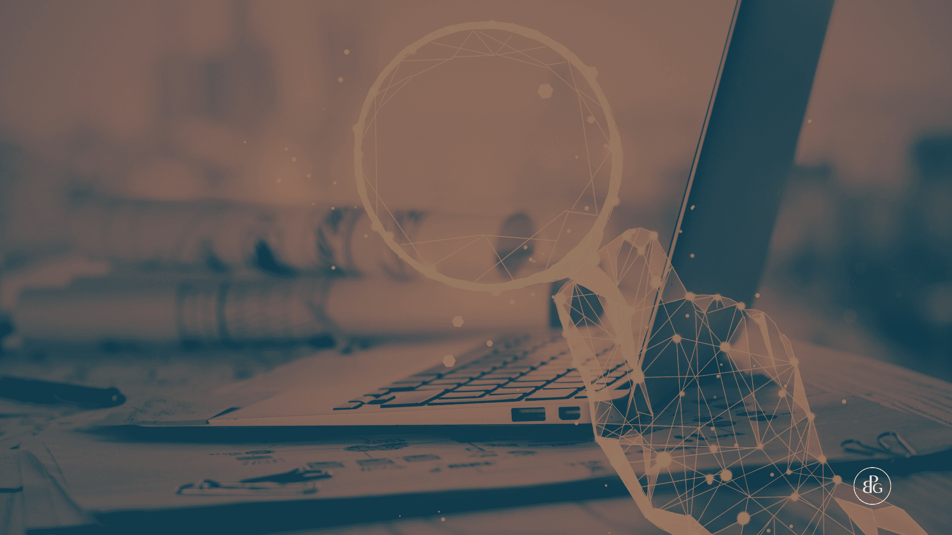 A view of a magnifying glass in front of a laptop to signify AI, GEO and SEO optimisation for investment firms and asset managers.